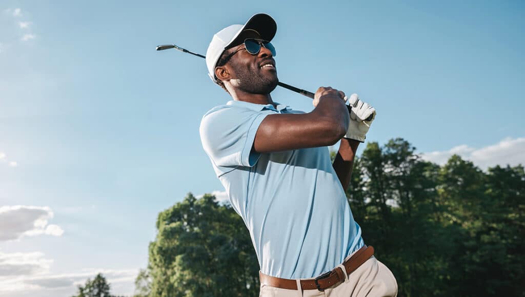 Person golfing